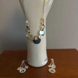 Nine West matching silver dangly earrings and necklace.
